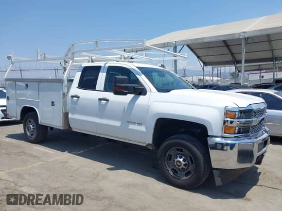 2019 Chevrolet Silverado 2500HD Work Truck with VIN 2GB2CREG1K1169904, listed as a IAAI auction lot 42762134 with 113,435 mi miles and . Bid and sale history available at DreamBid. Image 14.