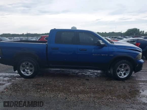2011 Ram 1500 Big Horn with VIN 1D7RV1CT3BS557941, listed as a IAAI auction lot 42867361 with 136,640 mi miles and . Bid and sale history available at DreamBid. Image 13.