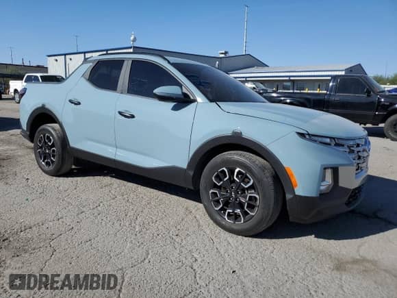 2022 Hyundai Santa Cruz SEL with VIN 5NTJCDAE6NH009830, listed as a Copart auction lot 71629124 with 42,707 mi miles and Salvage title. Bid and sale history available at DreamBid. Image 4.
