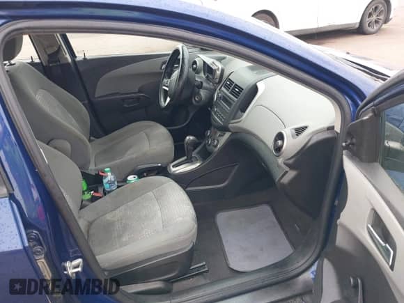 2014 Chevrolet Sonic LS with VIN 1G1JA5SH0E4142360, listed as a IAAI auction lot 43164934 with 114,869 mi miles and . Bid and sale history available at DreamBid. Image 5.