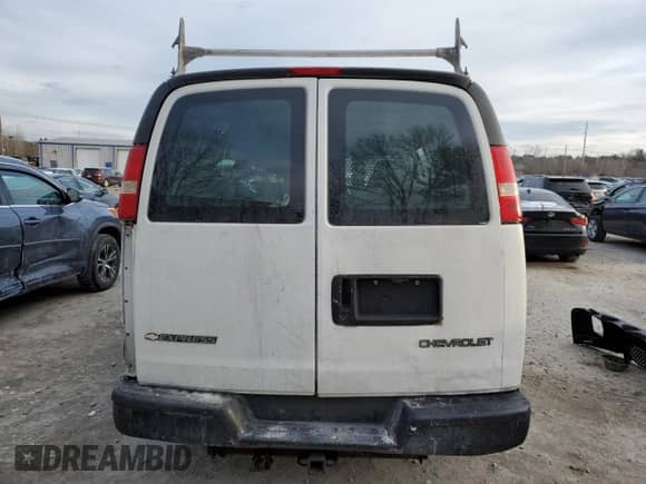 2005 Chevrolet Express Cargo с VIN 1GCHG35V951189334, выставлен на аукционе Copart как лот 88771545 с пробегом 241 972 миль миль и Чистый • Clean title. История ставок и продаж доступна на DreamBid. Изображение 6.