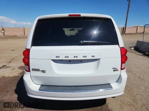 2016 Dodge Grand Caravan R/T with VIN 2C4RDGEG9GR347059, listed as a Copart auction lot 80558535 with 133,557 mi miles and Salvage title. Bid and sale history available at DreamBid. Image 6.