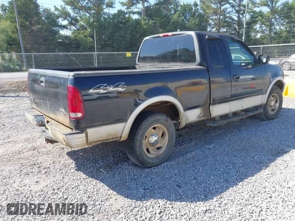 2000 Ford F-150 XL z VIN 1FTRX18L1YNA89731, wystawiony jako IAAI lot #43338921 z przebiegiem Nie podano mil oraz . Historia ofert i sprzedaży dostępna na DreamBid. Obrazek 4.