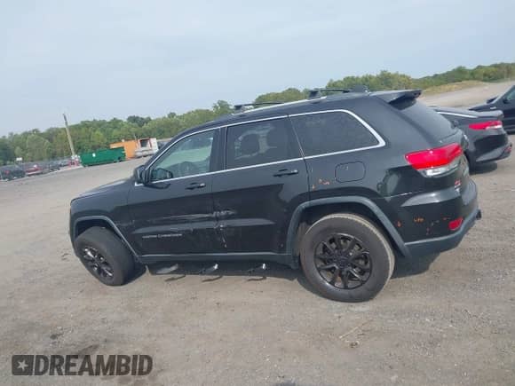 2016 Jeep Grand Cherokee Laredo with VIN 1C4RJFAG3GC396047, listed as a IAAI auction lot 43297273 with 160,023 mi miles and . Bid and sale history available at DreamBid. Image 14.