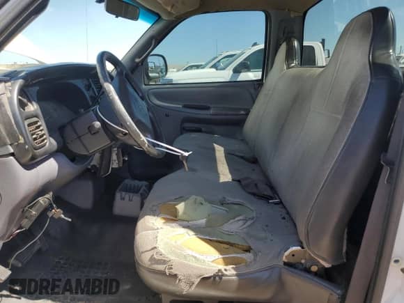 2001 Dodge RAM with VIN 3B6KC26ZX1M269062, listed as a Copart auction lot 56879715 with 172,568 mi miles and Salvage title. Bid and sale history available at DreamBid. Image 7.