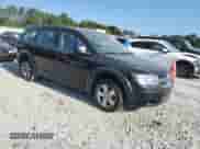 2013 Dodge Journey SE z VIN 3C4PDCAB1DT721733, wystawiony jako Copart lot #69377584 z przebiegiem 130 587 mil mil oraz Szkoda całkowita • Salvage title. Historia ofert i sprzedaży dostępna na DreamBid. Obrazek 4.