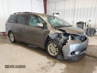 2015 Toyota Sienna XLE with VIN 5TDYK3DC1FS586331, listed as a IAAI auction lot 42820325 with 157,583 mi miles and . Bid and sale history available at DreamBid. Image 1.