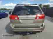 2010 Toyota Sienna CE z VIN 5TDKK4CC5AS336015, wystawiony jako Copart lot #87038765 z przebiegiem 241 385 mil mil oraz Szkoda całkowita • Salvage title. Historia ofert i sprzedaży dostępna na DreamBid. Obrazek 6.