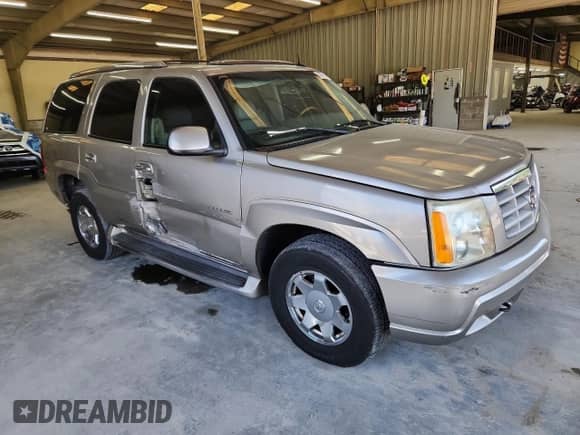 2003 Cadillac Escalade with VIN 1GYEK63NX3R263679, listed as a Copart auction lot 67063305 with 194,868 mi miles and Clean title. Bid and sale history available at DreamBid. Image 4.