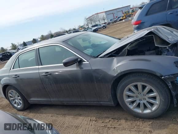 2013 Chrysler 300 with VIN 2C3CCAAG1DH714313, listed as a IAAI auction lot 41758896 with 84,873 mi miles and . Bid and sale history available at DreamBid. Image 14.