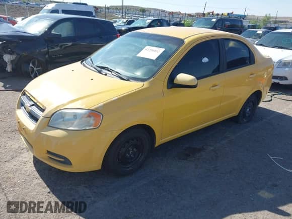 2011 Chevrolet Aveo 1LT with VIN KL1TD5DE0BB145588, listed as a IAAI auction lot 42756052 with 106,225 mi miles and . Bid and sale history available at DreamBid. Image 2.