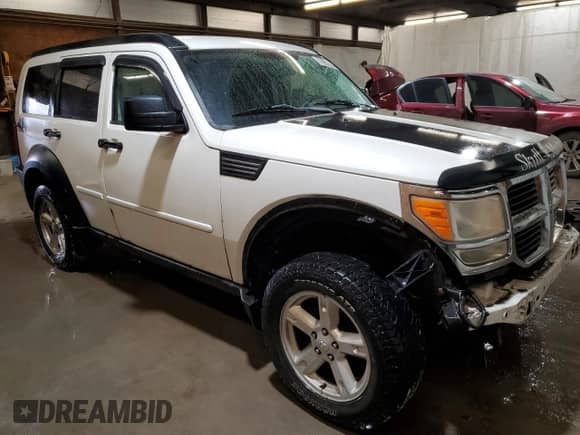 2007 Dodge Nitro SLT с VIN 1D8GU58K97W669625, выставлен на аукционе Copart как лот 79652324 с пробегом 102 954 миль миль и Списание • Salvage title. История ставок и продаж доступна на DreamBid. Изображение 4.