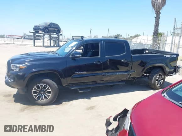 2022 Toyota Tacoma SR5 z VIN 3TMDZ5BN6NM123917, wystawiony jako IAAI lot #42206746 z przebiegiem 23 745 mil mil oraz . Historia ofert i sprzedaży dostępna na DreamBid. Obrazek 15.