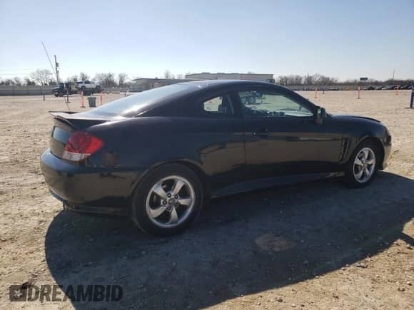 2006 Hyundai Tiburon GS с VIN KMHHM65D76U223249, выставлен на аукционе Copart как лот 45228195 с пробегом 45 420 миль миль и Списание • Salvage title. История ставок и продаж доступна на DreamBid. Изображение 3.