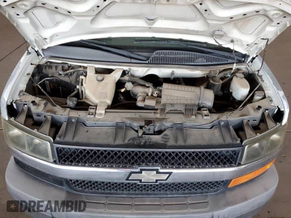 2012 Chevrolet Express Passenger 1LT с VIN 1GAZG1FG7C1123301, выставлен на аукционе Copart как лот 57155095 с пробегом 162 248 миль миль и Чистый • Clean title. История ставок и продаж доступна на DreamBid. Изображение 12.