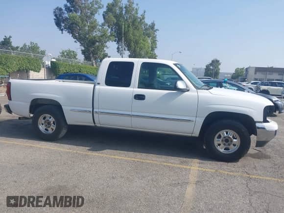 2000 GMC Sierra 1500 SLE z VIN 1GTEC19T0YZ300810, wystawiony jako IAAI lot #42471227 z przebiegiem Nie podano mil oraz . Historia ofert i sprzedaży dostępna na DreamBid. Obrazek 13.
