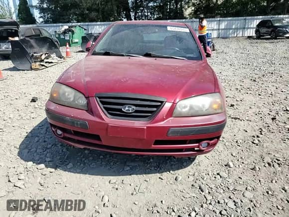 2004 Hyundai Elantra GT z VIN KMHDN56D14U109930, wystawiony jako Copart lot #65430945 z przebiegiem 74 504 mil mil oraz Szkoda całkowita • Salvage title. Historia ofert i sprzedaży dostępna na DreamBid. Obrazek 13.
