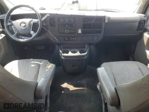 2014 Chevrolet Express Passenger LT с VIN 1GAZG1FG8E1139817, выставлен на аукционе Copart как лот 65780585 с пробегом 140 327 миль миль и Чистый • Clean title. История ставок и продаж доступна на DreamBid. Изображение 8.