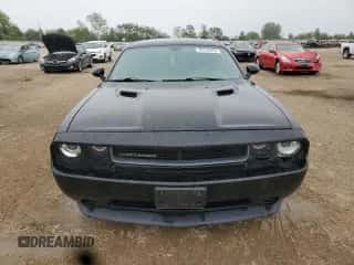 2014 Dodge Challenger SXT с VIN 2C3CDYAG4EH184457, выставлен на аукционе Copart как лот 70742655 с пробегом 114 266 миль миль и Списание • Salvage title. История ставок и продаж доступна на DreamBid. Изображение 5.