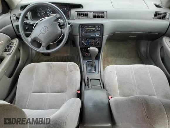 1998 Toyota Camry LE z VIN 4T1BF22K9WU926282, wystawiony jako Copart lot #81310465 z przebiegiem 206 233 mil mil oraz Szkoda całkowita • Salvage title. Historia ofert i sprzedaży dostępna na DreamBid. Obrazek 8.