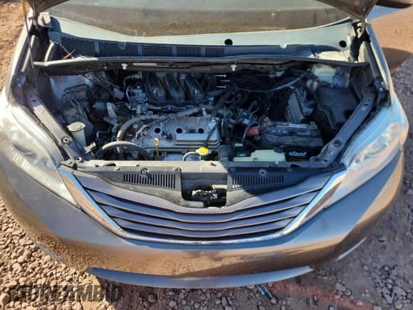 2015 Toyota Sienna LE z VIN 5TDKK3DC5FS571577, wystawiony jako Copart lot #82263595 z przebiegiem 120 131 mil mil oraz Szkoda całkowita • Salvage title. Historia ofert i sprzedaży dostępna na DreamBid. Obrazek 11.