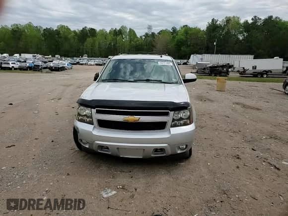 2014 Chevrolet Suburban LT с VIN 1GNSCJE00ER157634, выставлен на аукционе Copart как лот 53271405 с пробегом 244 830 миль миль и Списание • Salvage title. История ставок и продаж доступна на DreamBid. Изображение 12.