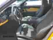 2013 BMW Z4 sDrive28i with VIN WBALL5C59DJ104203, listed as a Copart auction lot 59781425 with 116,002 mi miles and Salvage title. Bid and sale history available at DreamBid. Image 7.