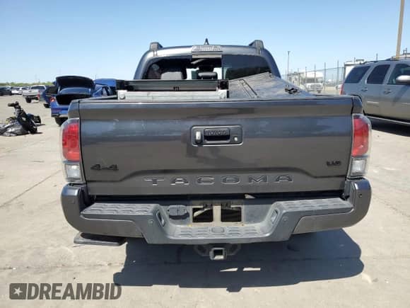 2021 Toyota Tacoma Limited with VIN 3TMGZ5AN0MM420386, listed as a Copart auction lot 52346285 with 49,912 mi miles and Salvage title. Bid and sale history available at DreamBid. Image 6.