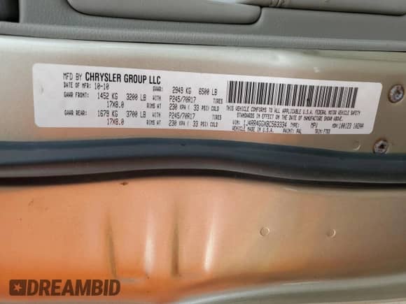 2011 Jeep Grand Cherokee 70th Anniversary with VIN 1J4RR4GGXBC563334, listed as a Copart auction lot 71876355 with 104,989 mi miles and Clean title. Bid and sale history available at DreamBid. Image 13.