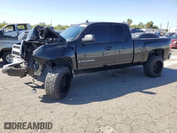 2007 Chevrolet Silverado 1500 1LT с VIN 2GCEC19C571729528, выставлен на аукционе Copart как лот 85708775 с пробегом Не указан миль и Списание • Salvage title. История ставок и продаж доступна на DreamBid. Изображение 1.