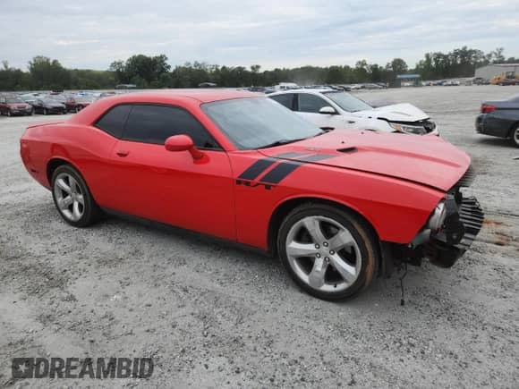 2014 Dodge Challenger R/T with VIN 2C3CDYBT8EH177264, listed as a Copart auction lot 70327855 with 105,628 mi miles and Salvage title. Bid and sale history available at DreamBid. Image 4.