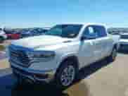 2021 Ram 1500 Longhorn with VIN 1C6SRFKT7MN679290, listed as a IAAI auction lot 43450315 with 55,494 mi miles and . Bid and sale history available at DreamBid. Image 2.