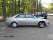 2005 Toyota Camry XLE with VIN 4T1BF30K95U106095, listed as a IAAI auction lot 43321498 with 260,118 mi miles and . Bid and sale history available at DreamBid. Image 13.