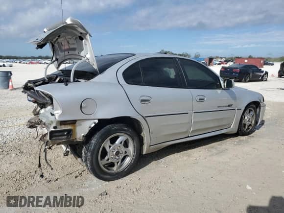 2002 Pontiac Grand Am GT с VIN 1G2NW52E02M507684, выставлен на аукционе Copart как лот 85694244 с пробегом 236 477 миль миль и Списание • Salvage title. История ставок и продаж доступна на DreamBid. Изображение 3.