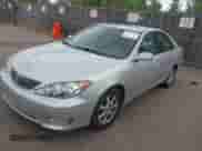 2005 Toyota Camry LE with VIN 4T1BF30K95U618598, listed as a IAAI auction lot 42912178 with 142,880 mi miles and . Bid and sale history available at DreamBid. Image 2.