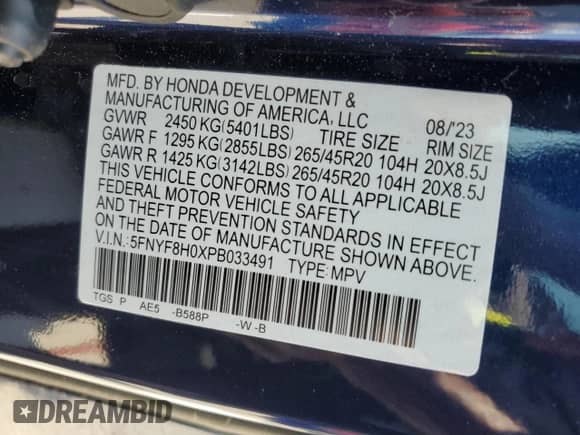 2023 Honda Passport Elite with VIN 5FNYF8H0XPB033491, listed as a Copart auction lot 57640815 with 19,628 mi miles and Salvage title. Bid and sale history available at DreamBid. Image 14.