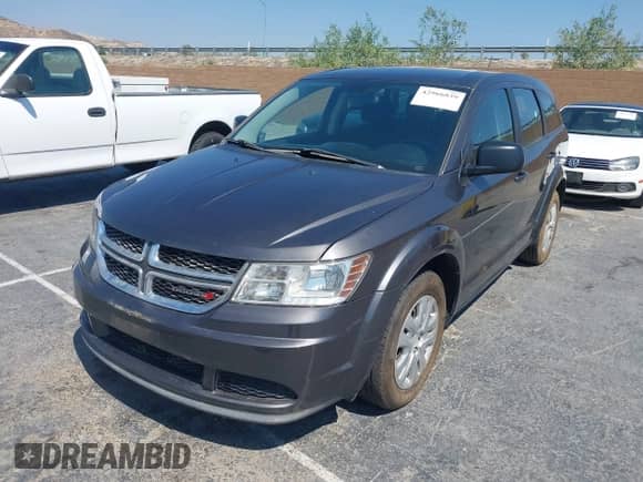 2014 Dodge Journey American Value with VIN 3C4PDCAB0ET258419, listed as a IAAI auction lot 42966839 with 129,381 mi miles and . Bid and sale history available at DreamBid. Image 2.
