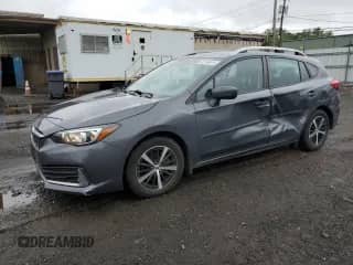 2022 Subaru Impreza Premium with VIN 4S3GTAV61N3715626, listed as a Copart auction lot 82146615 with 92,019 mi miles and Salvage title. Bid and sale history available at DreamBid. Image 1.