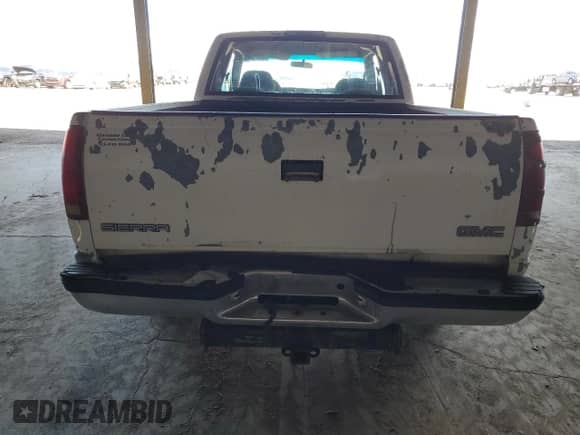 1998 GMC Sierra 1500 z VIN 2GTEC19M2W1527172, wystawiony jako Copart lot #54932665 z przebiegiem 294 133 mil mil oraz Szkoda całkowita • Salvage title. Historia ofert i sprzedaży dostępna na DreamBid. Obrazek 6.