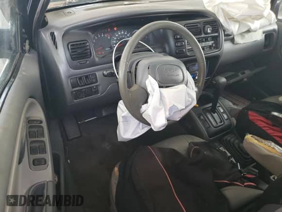 2003 Chevrolet Tracker LT с VIN 2CNBJ634536931981, выставлен на аукционе Copart как лот 71785304 с пробегом 150 918 миль миль и Списание • Salvage title. История ставок и продаж доступна на DreamBid. Изображение 8.
