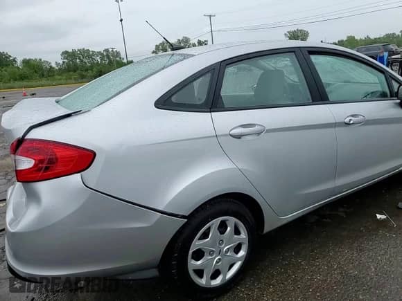 2012 Ford Fiesta S с VIN 3FADP4AJ5CM140340, выставлен на аукционе Copart как лот 69444035 с пробегом 81 571 миль миль и Чистый • Clean title. История ставок и продаж доступна на DreamBid. Изображение 14.