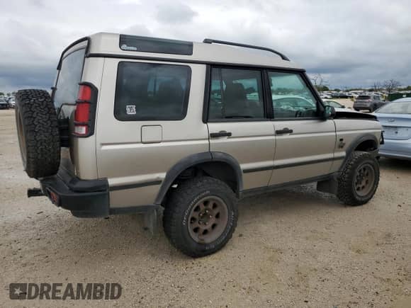 2002 Land Rover Discovery Cloth with VIN SALTY15482A752087, listed as a Copart auction lot 69861824 with Not provided miles and Salvage title. Bid and sale history available at DreamBid. Image 3.