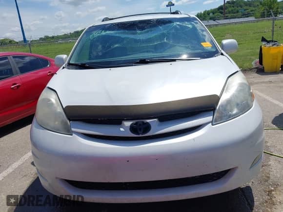 2007 Toyota Sienna XLE z VIN 5TDZK22C87S082670, wystawiony jako IAAI lot #42340249 z przebiegiem 227 064 mil mil oraz . Historia ofert i sprzedaży dostępna na DreamBid. Obrazek 12.