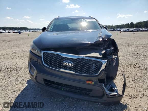 2018 Kia Sorento LX z VIN 5XYPG4A38JG396068, wystawiony jako Copart lot #70809795 z przebiegiem 88 765 mil mil oraz Szkoda całkowita • Salvage title. Historia ofert i sprzedaży dostępna na DreamBid. Obrazek 5.