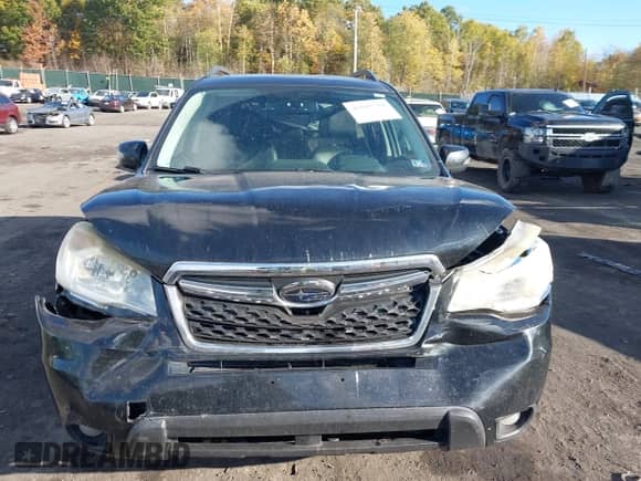 2014 Subaru Forester Touring with VIN JF2SJAMC8EH406036, listed as a IAAI auction lot 43505738 with 206,165 mi miles and . Bid and sale history available at DreamBid. Image 12.