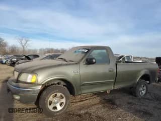 2002 Ford F-150 XL with VIN 2FTRF18W32CA50195, listed as a Copart auction lot 88857825 with 113,529 mi miles and Clean title. Bid and sale history available at DreamBid. Image 1.