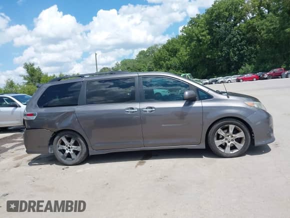 2014 Toyota Sienna SE with VIN 5TDXK3DC8ES443113, listed as a IAAI auction lot 42735795 with 235,269 mi miles and . Bid and sale history available at DreamBid. Image 14.
