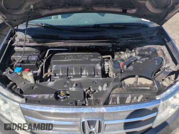 2013 Honda Odyssey EX-L with VIN 5FNRL5H61DB027011, listed as a Copart auction lot 69470375 with 123,161 mi miles and Salvage title. Bid and sale history available at DreamBid. Image 11.