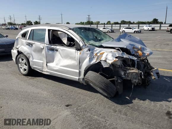2011 Dodge Caliber z VIN 1B3CB1HA4BD132590, wystawiony jako Copart lot #59318105 z przebiegiem Nie podano mil oraz Szkoda całkowita • Salvage title. Historia ofert i sprzedaży dostępna na DreamBid. Obrazek 4.