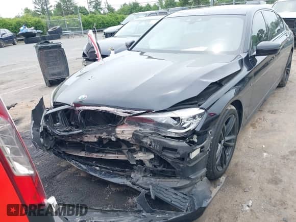 2019 BMW 7 Series 740i xDrive with VIN WBA7E4C54KGV28663, listed as a IAAI auction lot 42282060 with 73,109 mi miles and . Bid and sale history available at DreamBid. Image 12.
